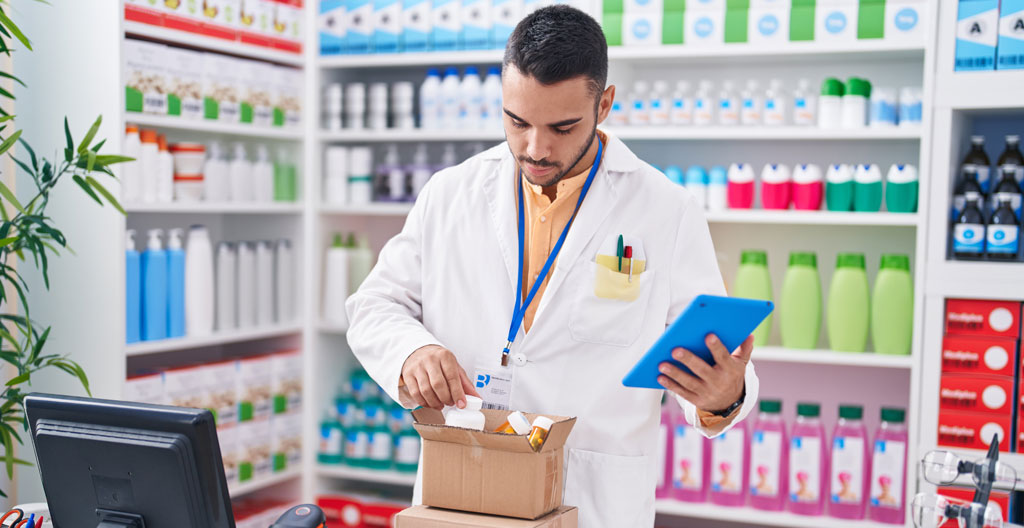 Man checking online pharmacy delivery and returns information on smartphone